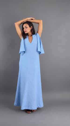Sky blue Moonlight Elegance maxi dress, model posing with raised arms – Pure Vibe